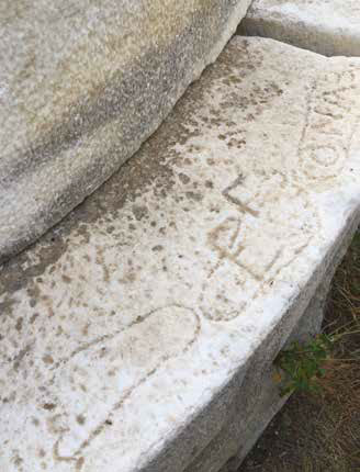 circular monument Krios, carvings footprints